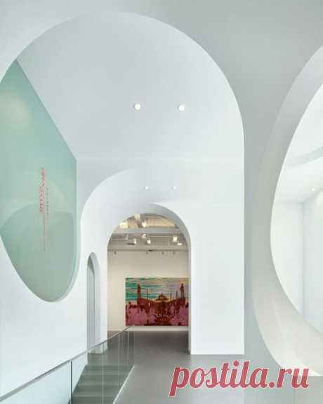 Beijing art gallery by Penda featuring topsy-turvy archways