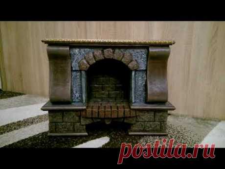 Камин из картона. Имитация деревянных колон. Фальш камин.A fireplace with a grate made of cardboard