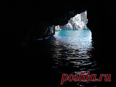 (5) This is Montenegro
Entering the this blue cave itself at first seems like a daunting experience – the rock above the entrance is low and as your eyes adjust, everything seems to be cast in extreme darkness. However, after realizing that the cavern is large enough to accommodate several boats, you pass a small bend and realize why this natural wonder is called the Blue Cave – luminous, brilliant blue light wells up from under the water and casts a blue shadow on the grotto’s ceiling aboveyou