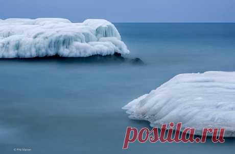 [30 second long exposure] Frozen lake spray on Lake Ontario rock breakwall - Kew Beach, Toronto More photos of Toronto and the polar vortex can be viewed here: tinyurl.com/y6eth2ch