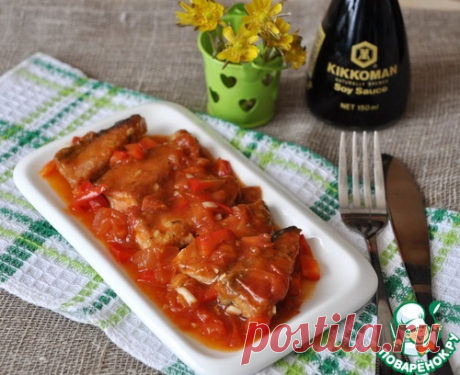 Рыба под пикантным томатным соусом - кулинарный рецепт