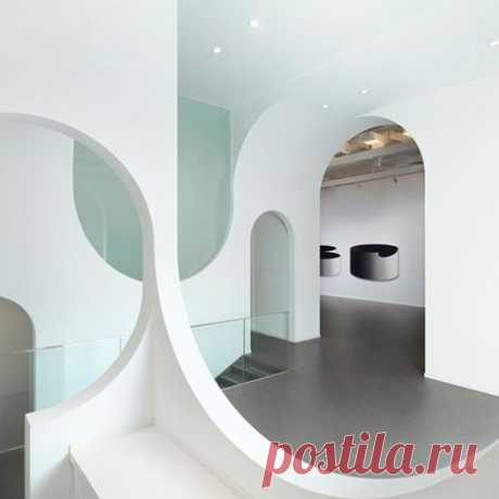 Beijing art gallery by Penda featuring topsy-turvy archways