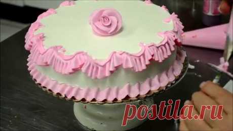 Chef Making a Pink Birthday Cake in Bakery This cake is made by our bakery chef at las vegas designed and decorated to make a birthday party special this design will be whipped cream icing also the co...