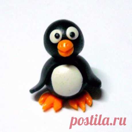 How to make a polymer clay penguin via @Guidecentral - Visit www.guidecentr.al for more #DIY #tutorials