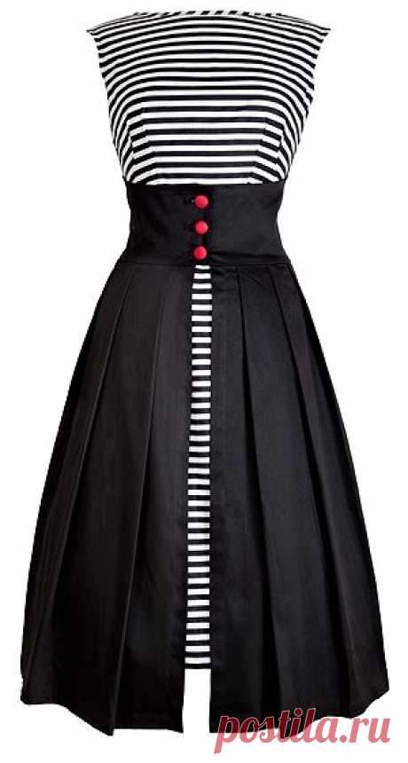 Съёмная деталь платья. На пуговицах. Что-то вроде удлинённой баски.