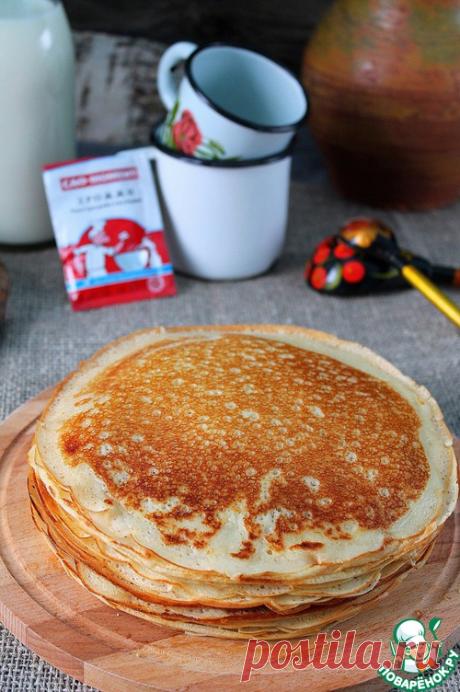 Простые дрожжевые блины на молоке - кулинарный рецепт