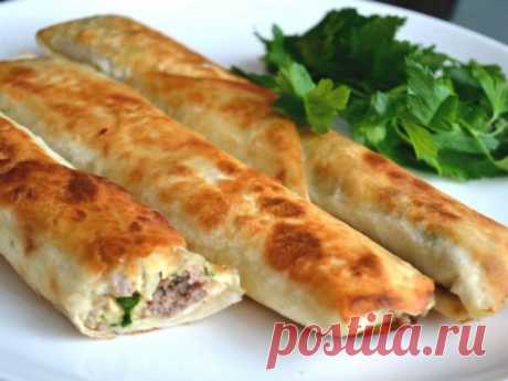 Ось як приготувати фарширований лаваш, запечений в духовці Фарширований лаваш, запечений в духовці — дуже смачна закуска, що має багато варіантів приготування. Страва готується швидко, виходить апетитною і ситною. Продукти: Тонкий лаваш М’ясо або будь-які вироби з...