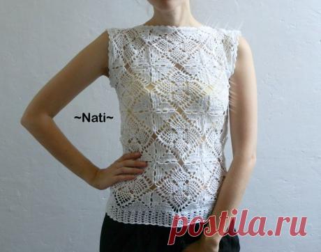 Белая ажурная кофточка.
Пряжа: PELICAN (Vita Cotton)
Состав: 100% хлопок.
Познакомится подробнее с моим творчеством можно в моей группе: https://vk.com/vazanie_ot_nati Другие фото этого топа по ссылке