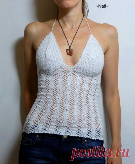 Эластичны белый топ.
Размер: 42
Пряжа: Alize "Diva stretch".
Познакомится подробнее с моим творчеством можно в моей группе: https://vk.com/vazanie_ot_nati
Схема топа по ссылке