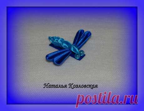 стрекоза на зажиме