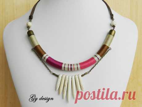 Spike statement thread necklace colorful thread wrapped necklace rope necklace spring necklace summer necklace choker necklace tube necklace This cylindric necklace is handmade wrapped with colorful cotton embroidery thread (metal purple,pink, chocolate brown, beige) I used bronze tone brass finishing, howlite beads and suede cord. At the middle is 7 cream howlite spikes and bronze beads. Measurements: length 18 1/2 (47 cm). Each cylindric part is 8 (20 cm) long, 1/3 (10...