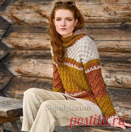 Яркий пуловер связан спицами разнообразными структурами: «Ромбы», «Зигзаги» и «Косы» из разноцветной пряжи природных оттенков.