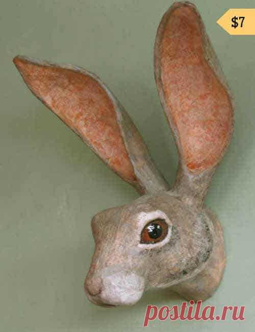 This pattern helps you create an over-sized jackrabbit head faux trophy mount for your wall. Cut out the pieces, tape them together, and cover with paper mache.