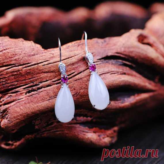 925 Silver Earrings/Hetian Jade Earrings/Water Drop Earrings/Christmas Gifts Product Details:  Material: 925 silver, Hetian jade  color: White  Shape: water droplets  Size: Water droplets and Tian Yuchang: 18mm width: 9mm.  The earrings are 39mm long (including ear hooks) and 9mm wide.  Weight: 4.9 grams  Translucent: translucent  Symbol: Good luck to you