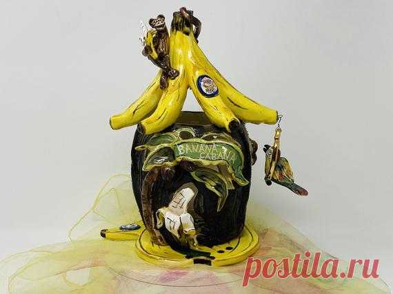 Heather Goldminc Signed & Dated 2001 Blue Sky Corp. Clayworks | Etsy Amazing and rare piece by Heather Goldminc for Blue Sky Corp. Clayworks!  This whimsical Banana Cabana is priceless! Monkeys and bananas galore. Complete with Monkey Brand stickers on the banana peels and a swinging parrot. The Cabana sits on top of a banana bunch underplate.  Fantastic condition -