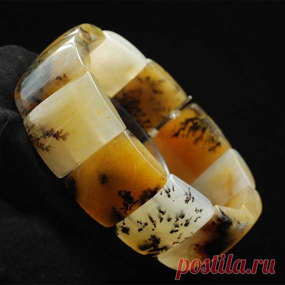 Huanglong jade grass pattern men's wide bracelet / wide bracelet / unique bracelet / elastic bracelet / bracelet cuffs Product Details:  Material: Huanglong jade  Color: picture color  shape: rectangle  Size: single piece width about 20mm, height about 25mm  The inner circumference is about 20cm, and each piece of 11 pieces of jade  Translucent: translucent  Symbol: Good luck to you