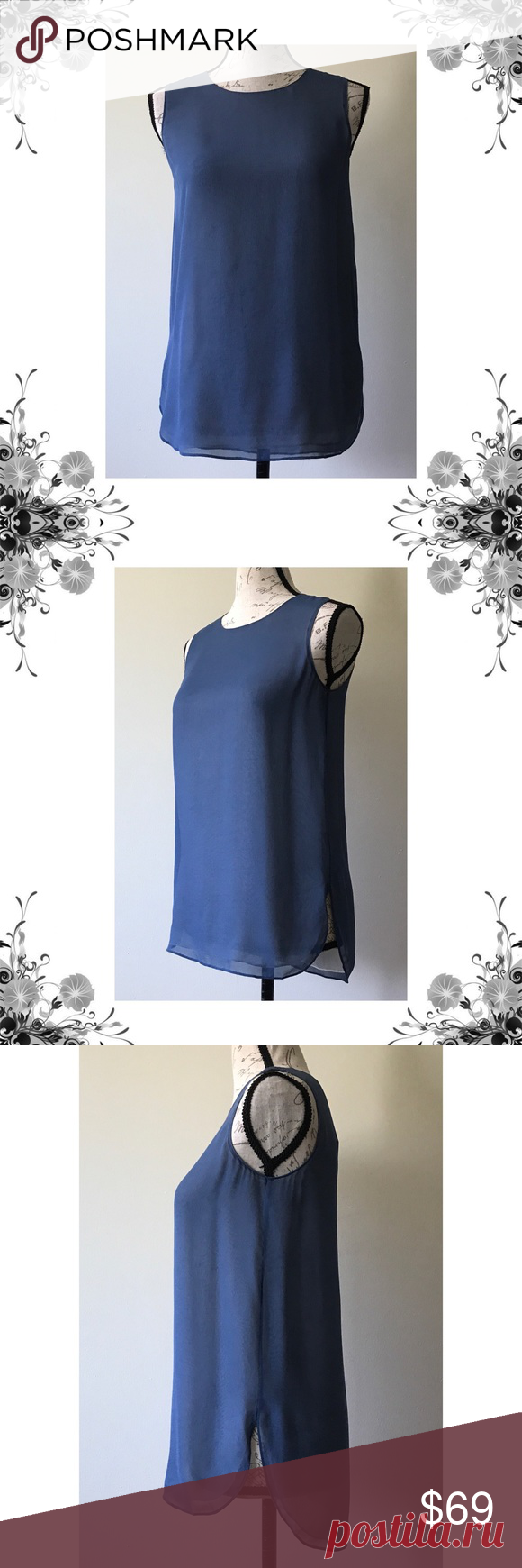 {Vince} Blue Sheer Layered 100% Silk Top New with tags with minor flaw. *Inside tag is partially detached. Please see pics. Chest across measures approx 16.5”. Length is approx 25” in the front and 26.5” in the back. Sleeveless. Layered. 100% Silk. Button keyhole closure at back. Bundle for discounts! 5lb bundle weight limit. Thank you for shopping my closet!  Bin 70 Vince Tops Blouses