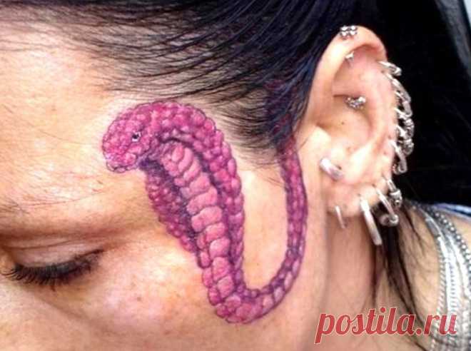 Татуировка в виде змеи на лице девушки — фото, рисунки, эскизы